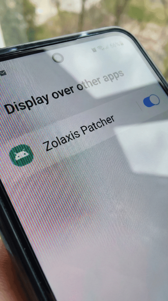 Turning on Display Over Other Apps permission for Zolaxis Patcher.